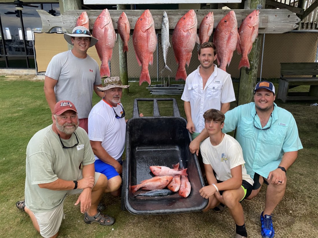 Crew and catch at the Wild Orange dock