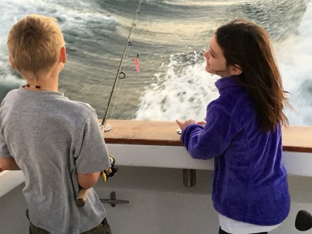 Kids fishing off the back deck